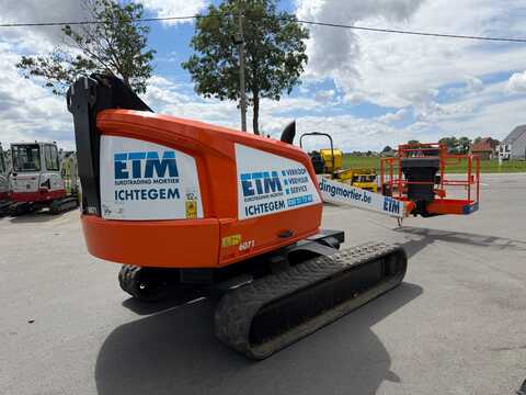 Huur een JLG 400SC - Hoogwerker op rupsen - Image #5