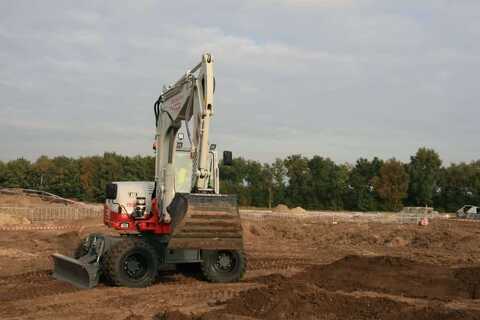 Koop een Takeuchi TB395W - Graafmachine op banden - Image #3