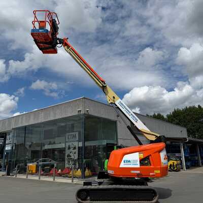 Huur een JLG 400SC - Hoogwerker op rupsen - Image #1